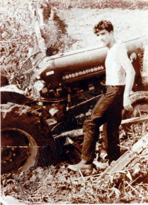 This is Elvis getting his tractor stuck in the mud. The parallels are there. 